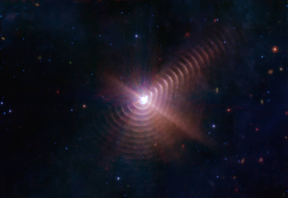 Rings of dust, formed from stellar winds, as seen by the Webb Telescope.