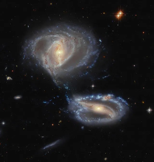 The Hubble Space Telescope captured the dance of galaxies known as Arp-Madore 2339-661.