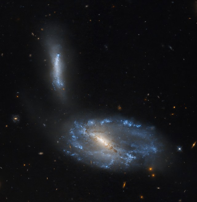 Hubble studies a sparkling galaxy pair NGC 5410 and UGC 8932/PGC 49896.